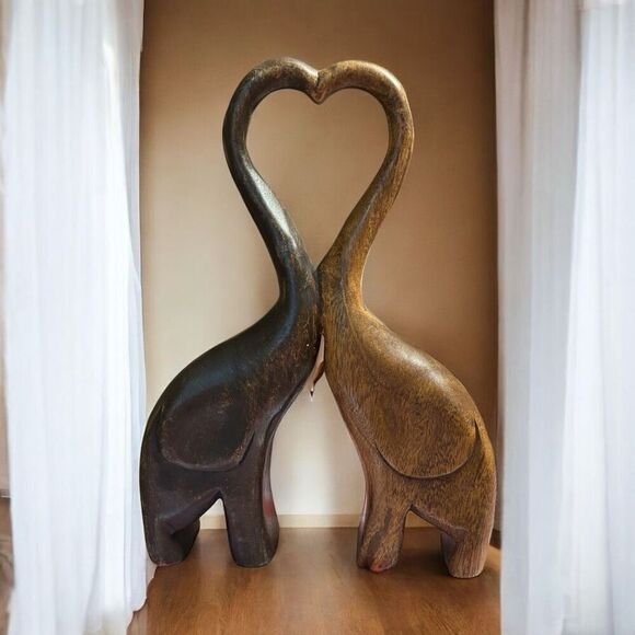 Mid century wood sculpture hand craved elephants heart shaped trunks